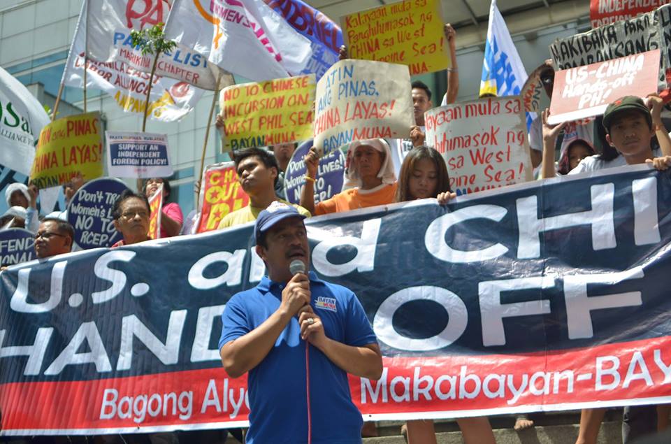 Bayan Muna partylist Rep. Carlo Zarate speaks in front of the Chinese consulate on June 12, 2017 (Photo by Carlo Manalansan/Bulatlat)