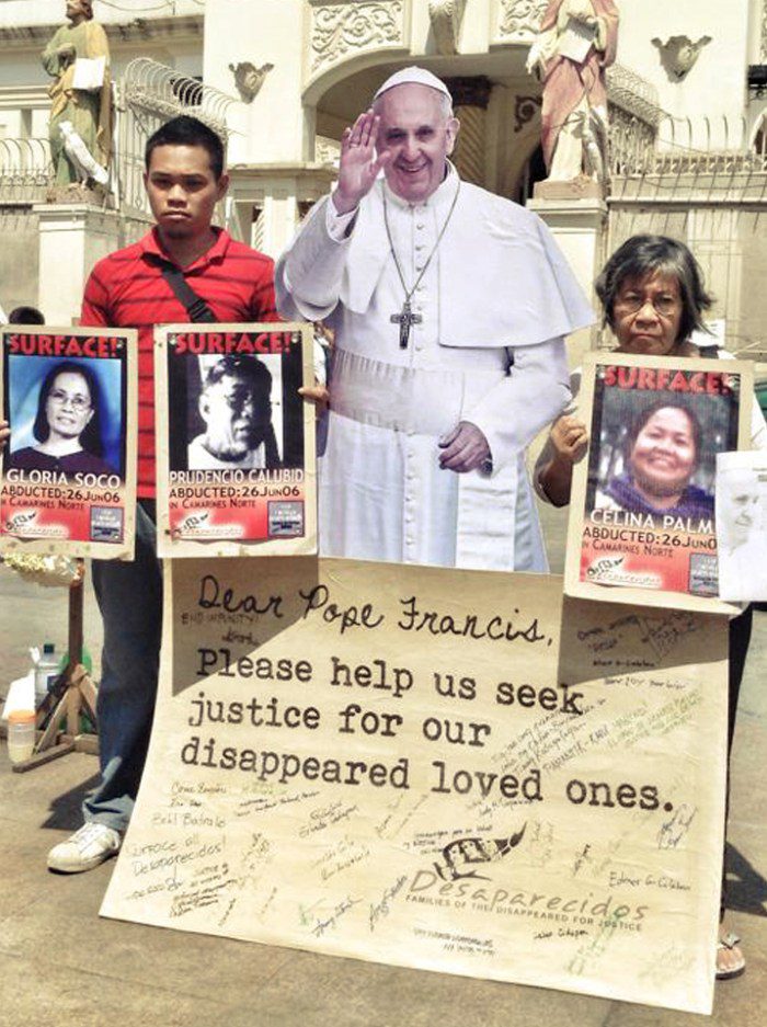 Ipe Soco and another member of Desaparecidos, Beth Calubad, in their appeal to Pope Francis before his visit in 2015 (Contributed photo)