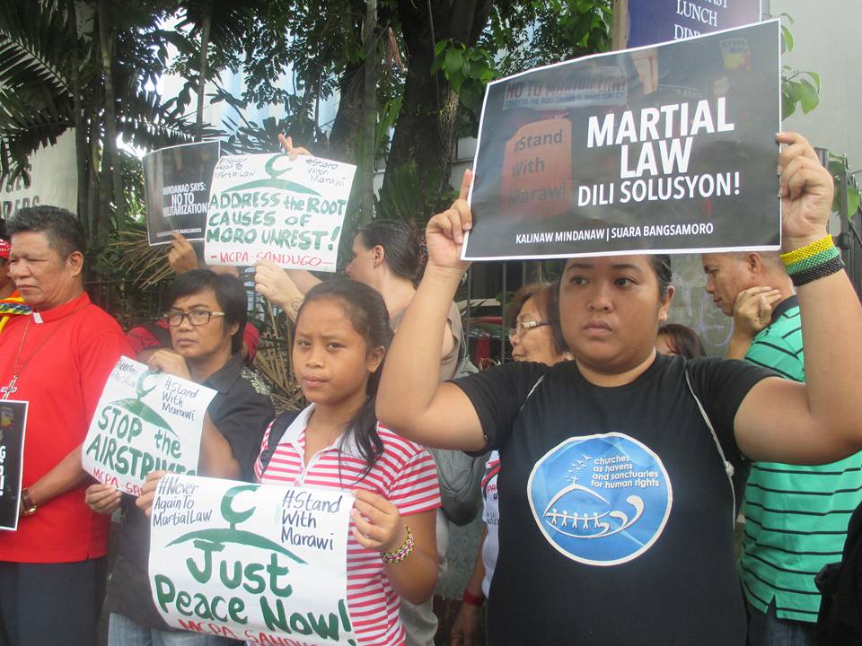 Progressives protest against martial law in Mindanao outside the NCCP gates in Quezon City on May 31, 2017 (Photo by Lito Ocampo)
