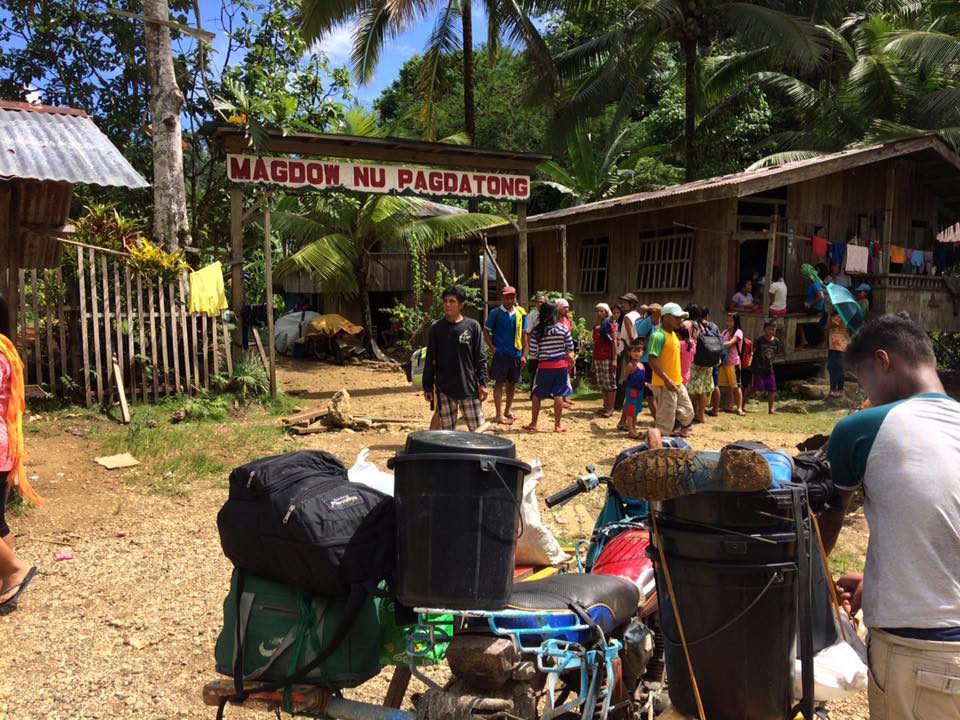 Residents and students of the Lumad schools in Han-ayan community in Diatagon village, Lianga, Surigao del Sur get ready to evacuate on July 5. (Contributed photo)