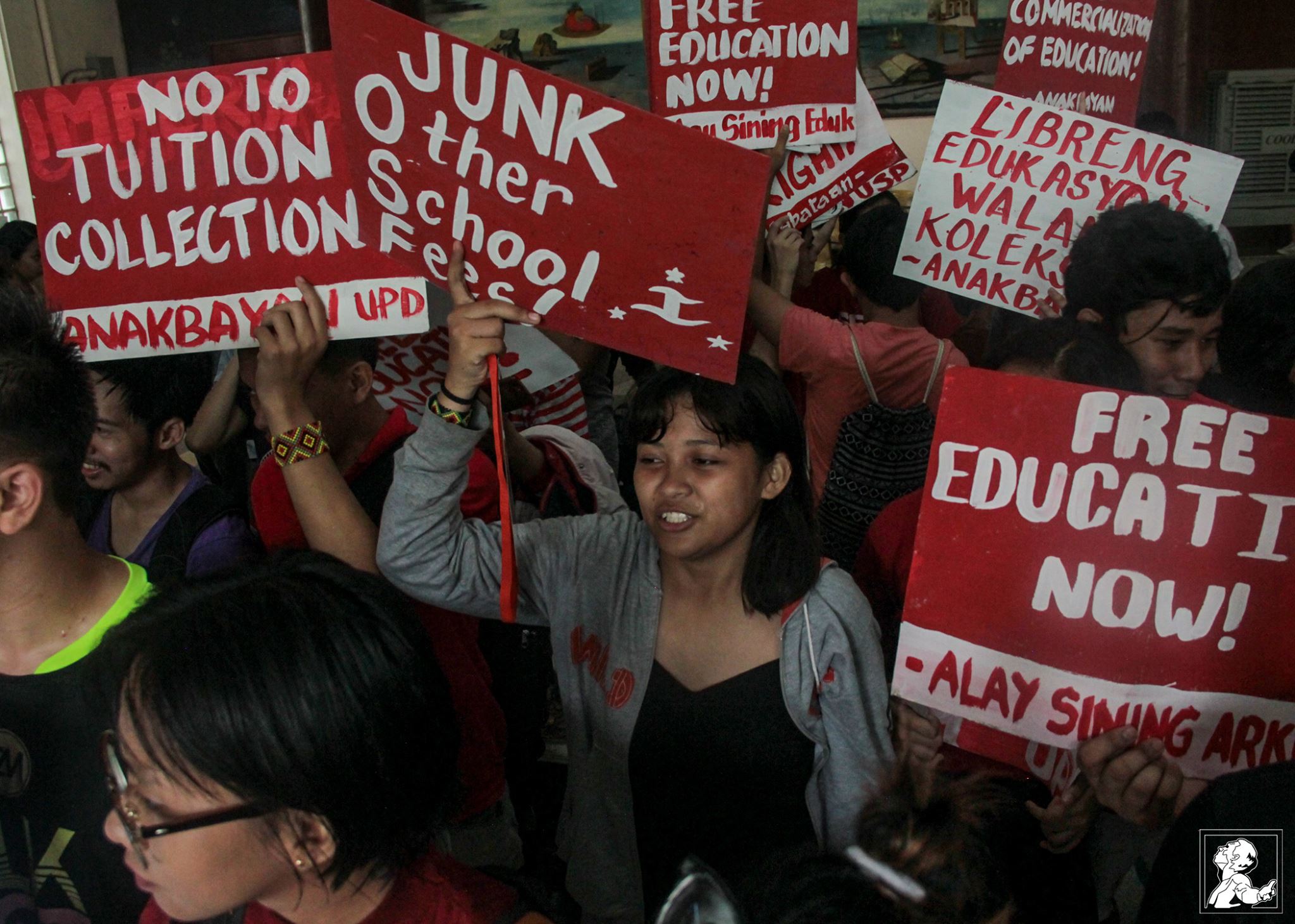 UP students staged a protest at the Palma Hall Steps on Aug. 4, to denounce the collection of fees in the state university, in spite of the allocation of funds for tuition subsidy (Photo courtesy of Patricia Pobre/Philippine Collegian)