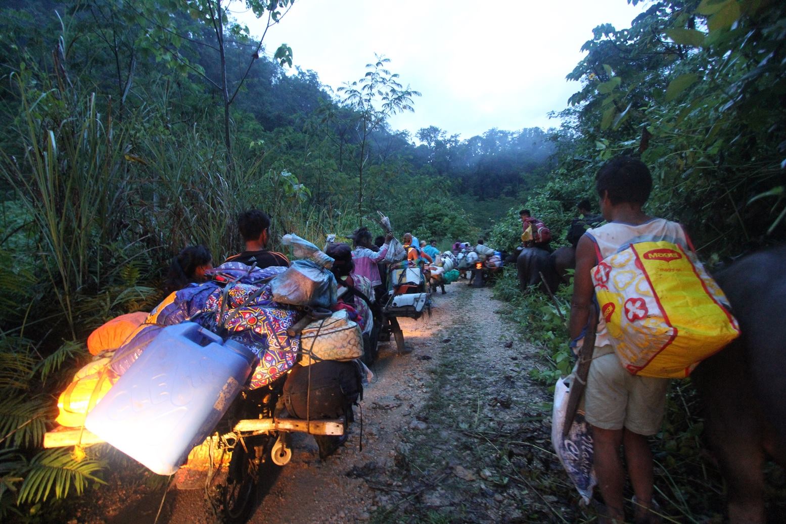 Lumad residents of Diatagon village evacuate on July 5 (Photo grabbed from Chad Booc Facebook)