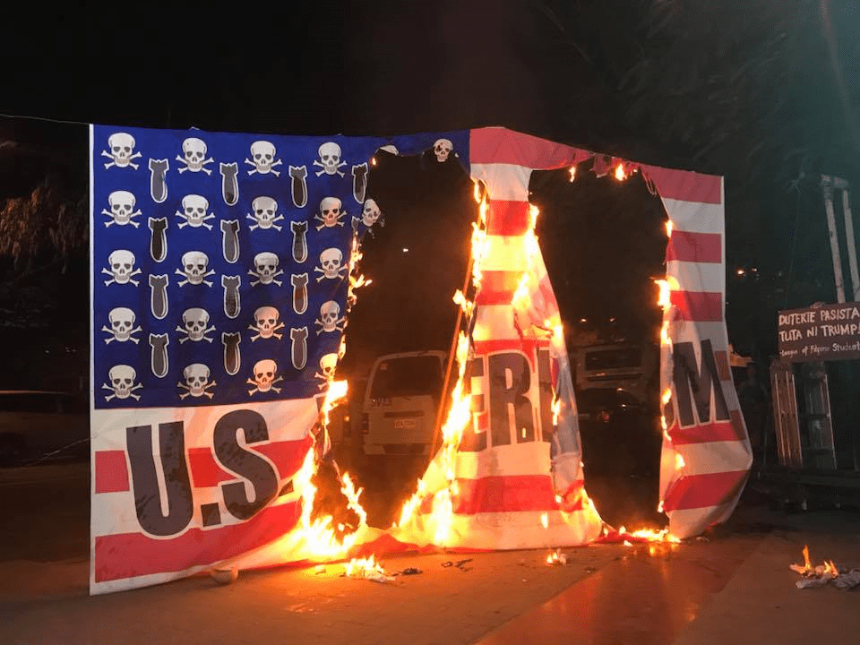 ban trump nov1317 US flag burn by ruth