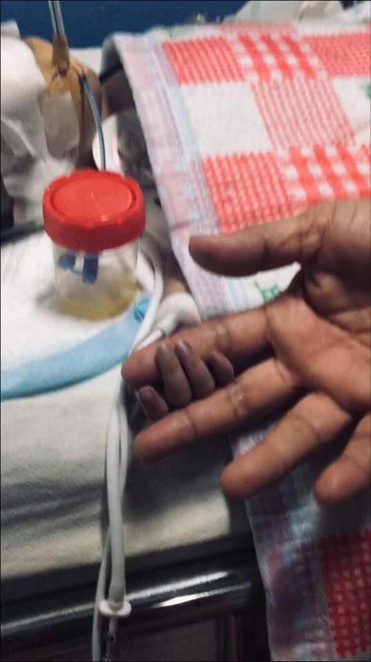 baby river tiny hands
