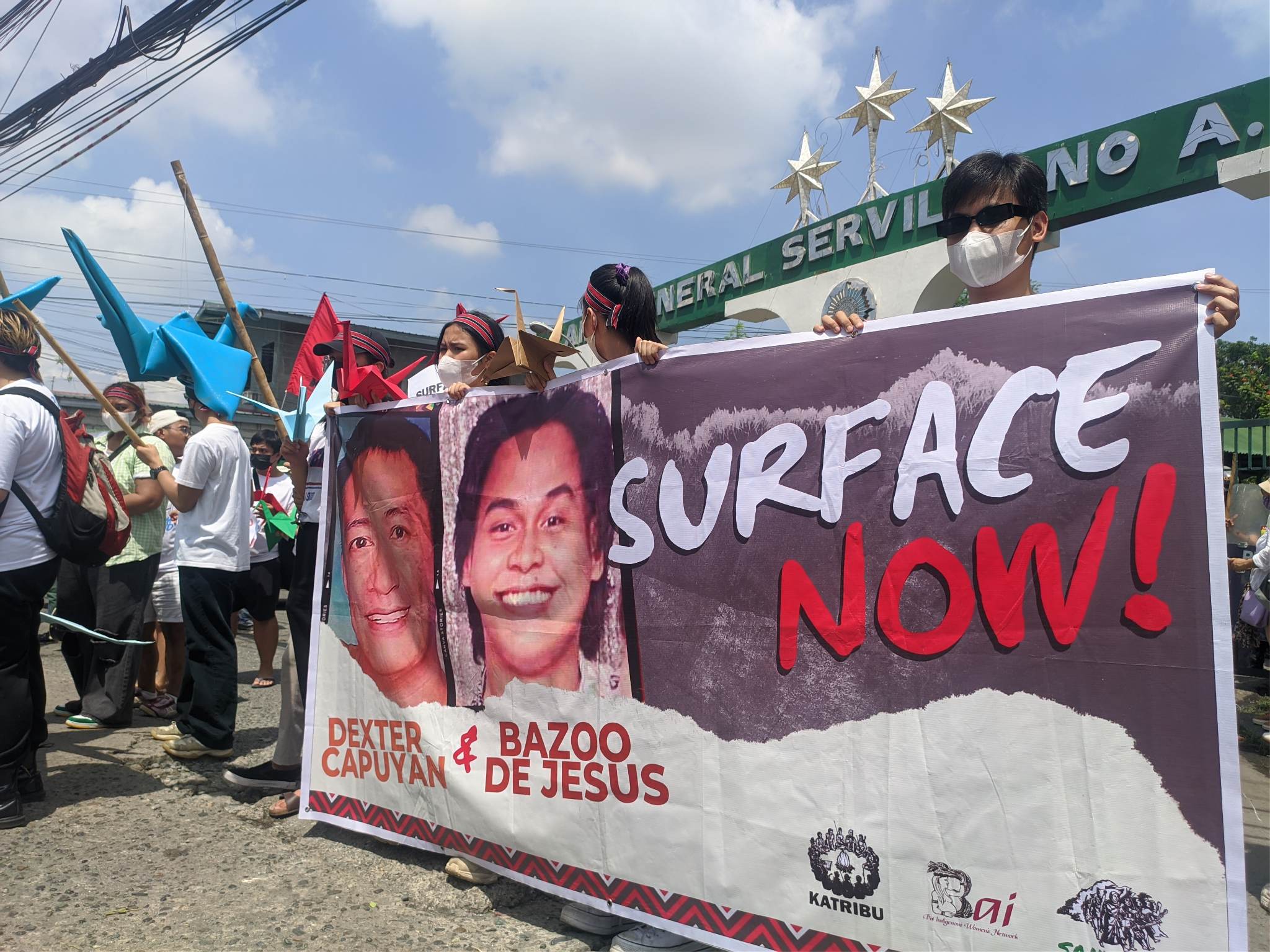 Activists hold a protest in front of Camp Servillano Aquino June 7 to demand the military to surface Dexter Capuyan and Gene Roz Jamil "Bazoo" dela Cruz.