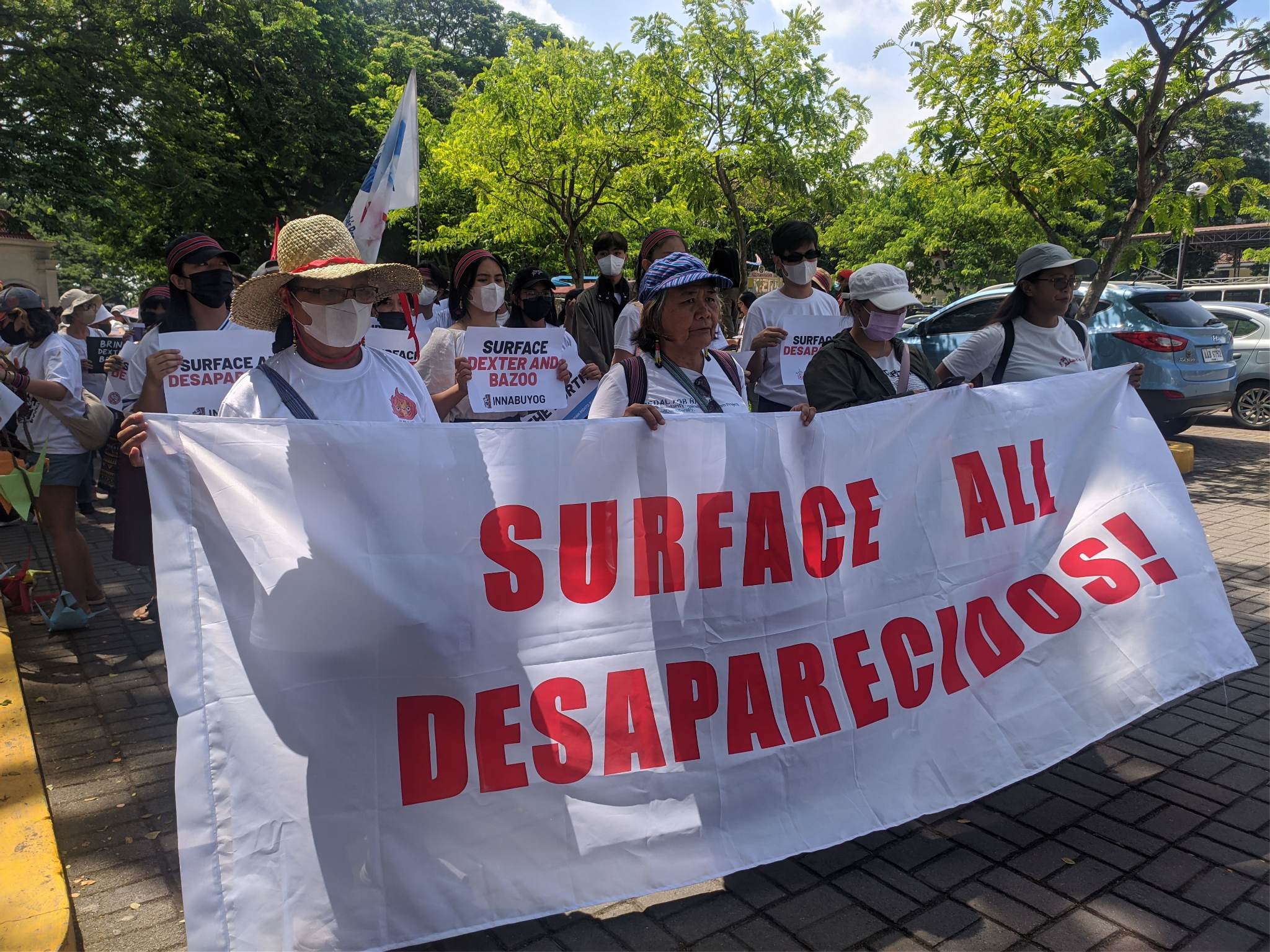 Activists hold a protest in front of Camp Servillano Aquino June 7 to demand the military to surface Dexter Capuyan and Gene Roz Jamil "Bazoo" dela Cruz. 