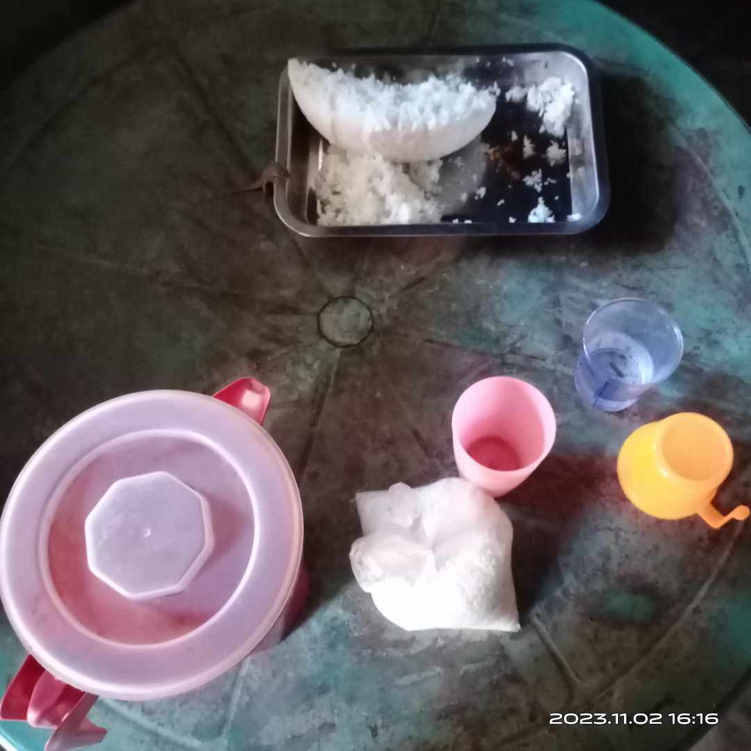 On most days, Rodolfo Basas and his wife only have salt to go with rice. (Photo by Gene Albert Coles)