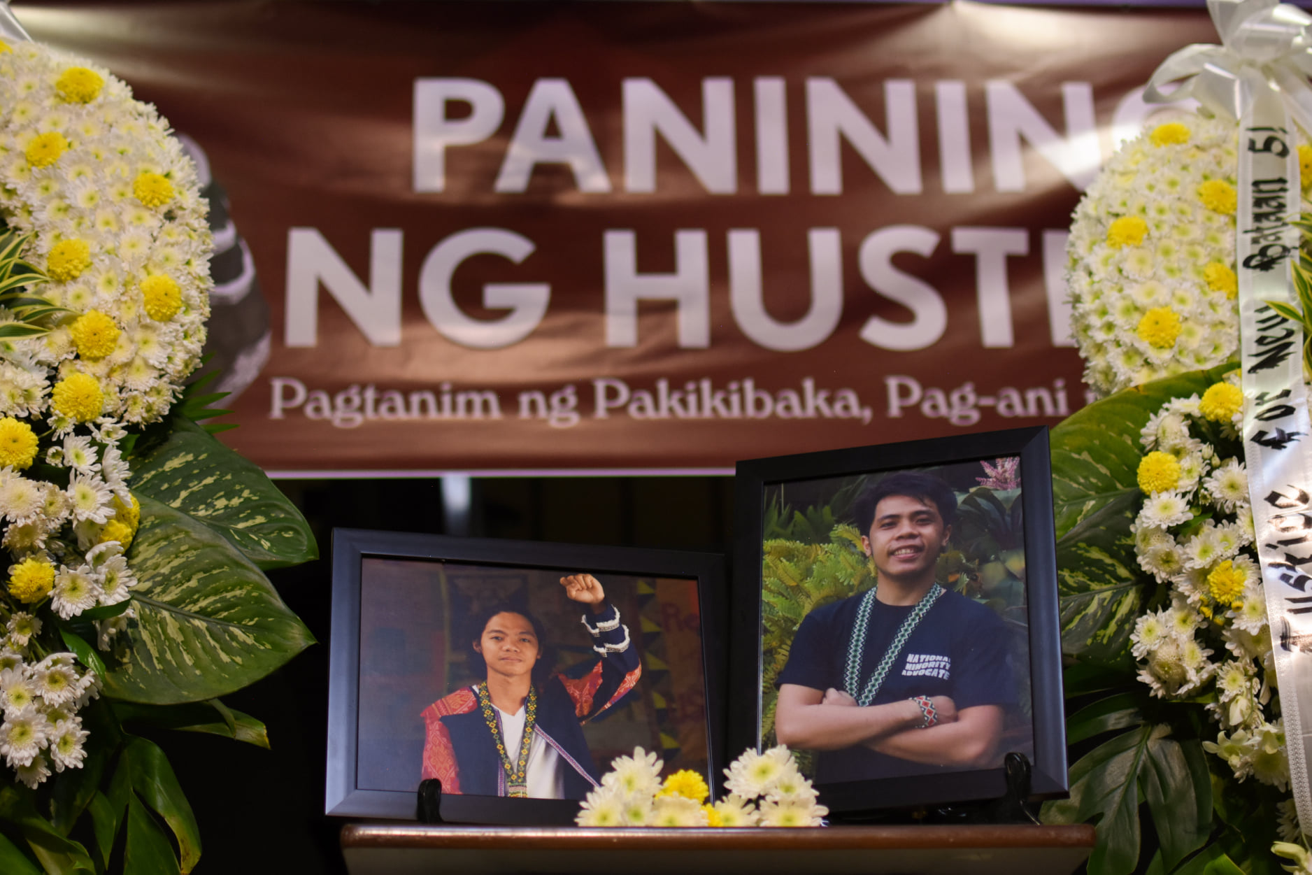 20220307_Friends and colleagues display photos of Chad and Jurain in a UP event_Photo by Carlo Manalansan_Bulatlat